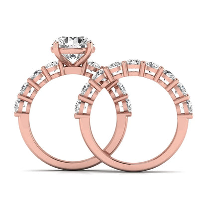 Round prong set lab grown diamond bridal ring set featuring a 2.50 carat round center diamond with double-row round accent diamonds in rose gold finish.