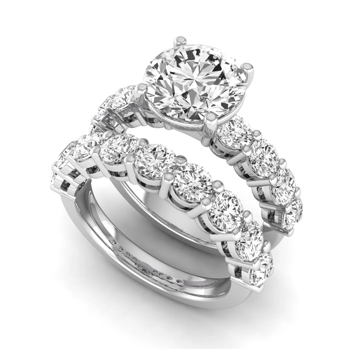 Round prong set lab grown diamond bridal ring set featuring a 2.50 carat round center diamond with double-row round accent diamonds in white gold finish.