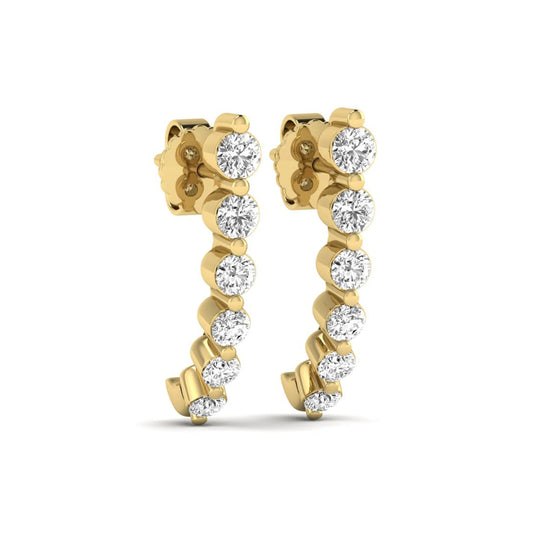 Round cut prong set lab grown diamond climber earrings featuring a curved graduated diamond design with push back closure in yellow gold tone.