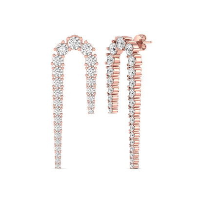 Round prong set lab grown diamond curved crawler earrings featuring graduating round diamonds in a rose gold tone with push back closure.