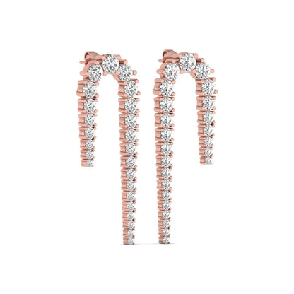 Round prong set lab grown diamond curved crawler earrings featuring graduating round diamonds in a rose gold tone with push back closure.