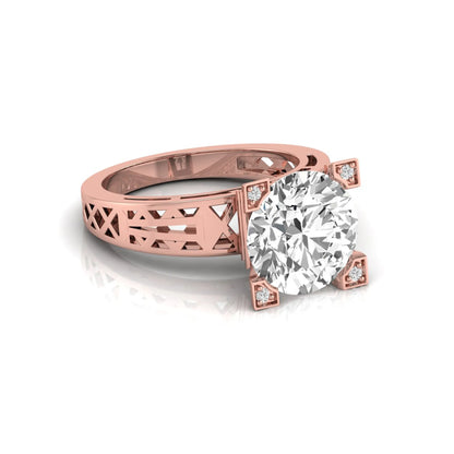Round cut lab grown diamond engagement ring featuring a four-prong setting with round accent diamonds and a geometric rose gold style openwork band.