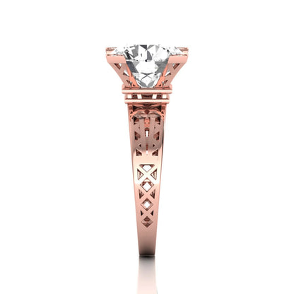Round cut lab grown diamond engagement ring featuring a four-prong setting with round accent diamonds and a geometric rose gold style openwork band.