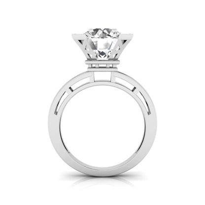 Round cut lab grown diamond engagement ring featuring a four-prong setting with round accent diamonds and a geometric white gold style openwork band.