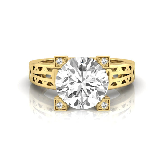 Round cut lab grown diamond engagement ring featuring a four-prong setting with round accent diamonds and a geometric yellow gold style openwork band.