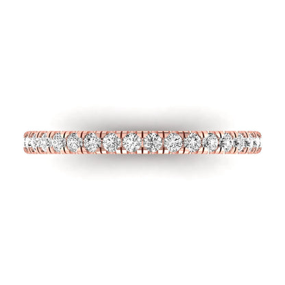 Round prong set lab grown diamond half eternity band ring featuring round diamonds in an elegant stackable wedding band design in rose gold