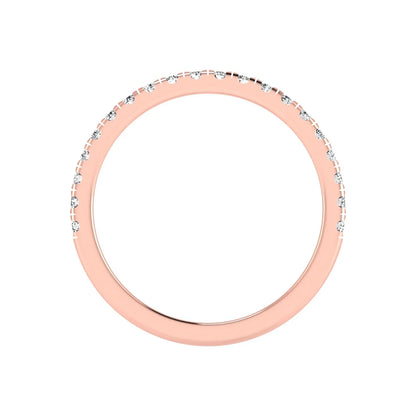 Round prong set lab grown diamond half eternity band ring featuring round diamonds in an elegant stackable wedding band design in rose gold