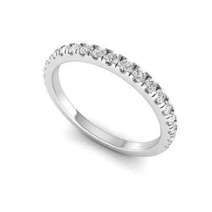 Round prong set lab grown diamond half eternity band ring featuring round diamonds in an elegant stackable wedding band design in white gold