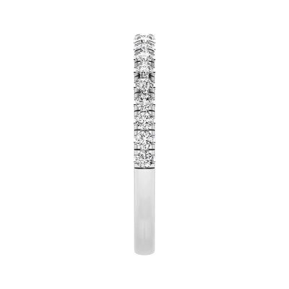 Round prong set lab grown diamond half eternity band ring featuring round diamonds in an elegant stackable wedding band design in white gold