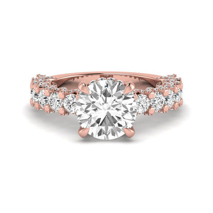 Round prong set lab grown diamond hidden halo engagement ring featuring a 9.45 mm round center diamond with pavé cathedral band and graduated round side diamonds in rose gold