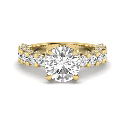 Round prong set lab grown diamond hidden halo engagement ring featuring a 9.45 mm round center diamond with pavé cathedral band and graduated round side diamonds in yellow gold