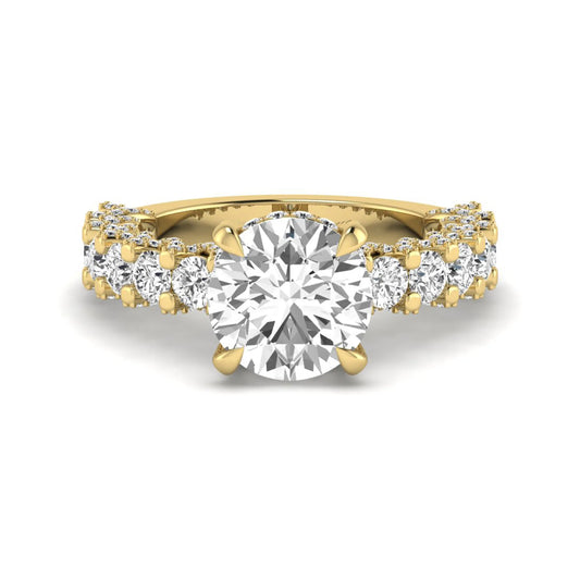Round prong set lab grown diamond hidden halo engagement ring featuring a 9.45 mm round center diamond with pavé cathedral band and graduated round side diamonds in yellow gold
