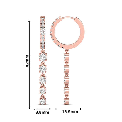 Round cut prong set lab grown diamond hoop drop earrings with diamond accented hinged hoop and graduated drop design in rose gold tone.