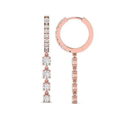 Round cut prong set lab grown diamond hoop drop earrings featuring a diamond accented hinged hoop with a graduated linear drop in rose gold tone.