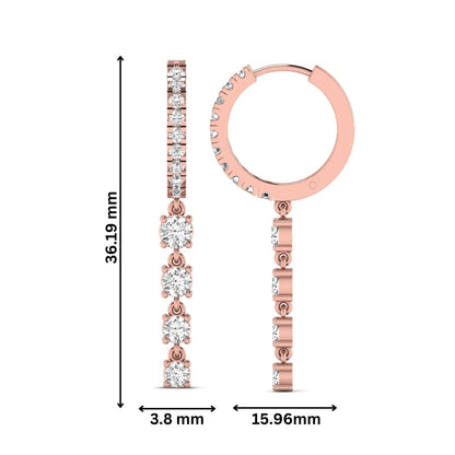 Round cut prong set lab grown diamond hoop drop earrings featuring a diamond accented hinged hoop with a graduated linear drop in rose gold tone.