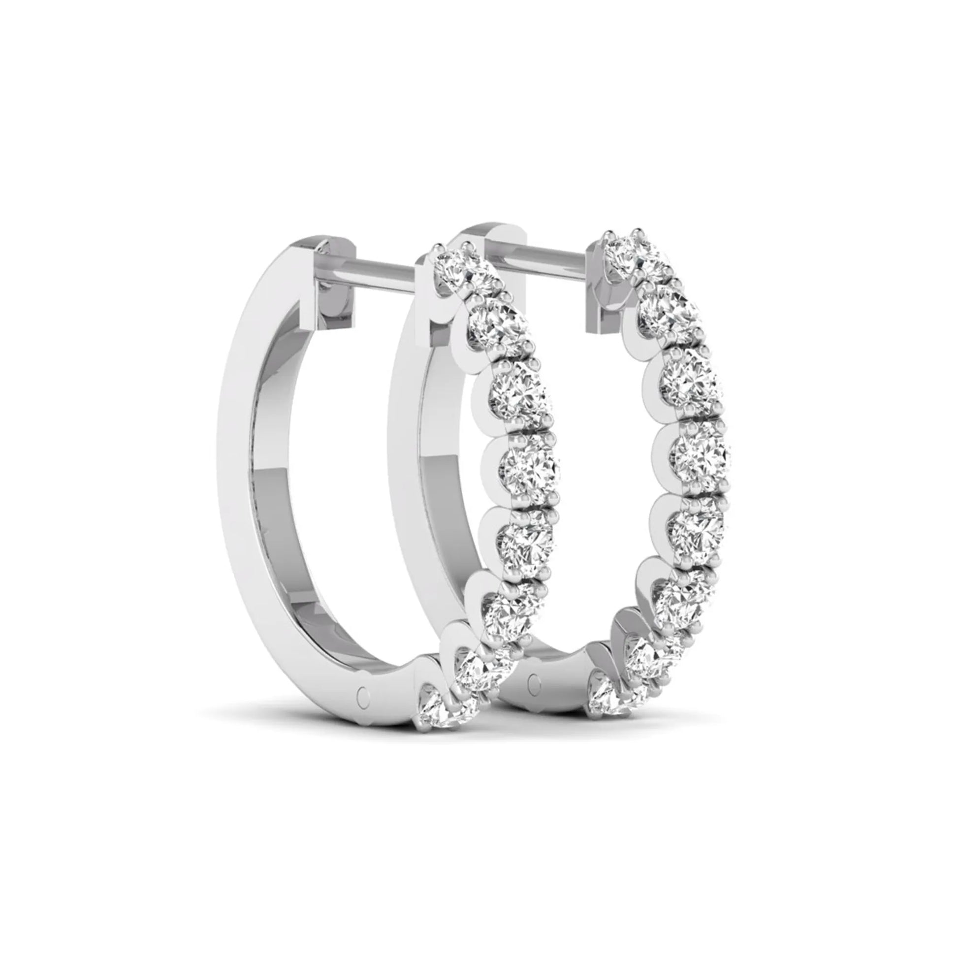 Round prong set lab grown diamond hoop earrings featuring brilliant round cut diamonds in a white gold finish with a hinged closure.