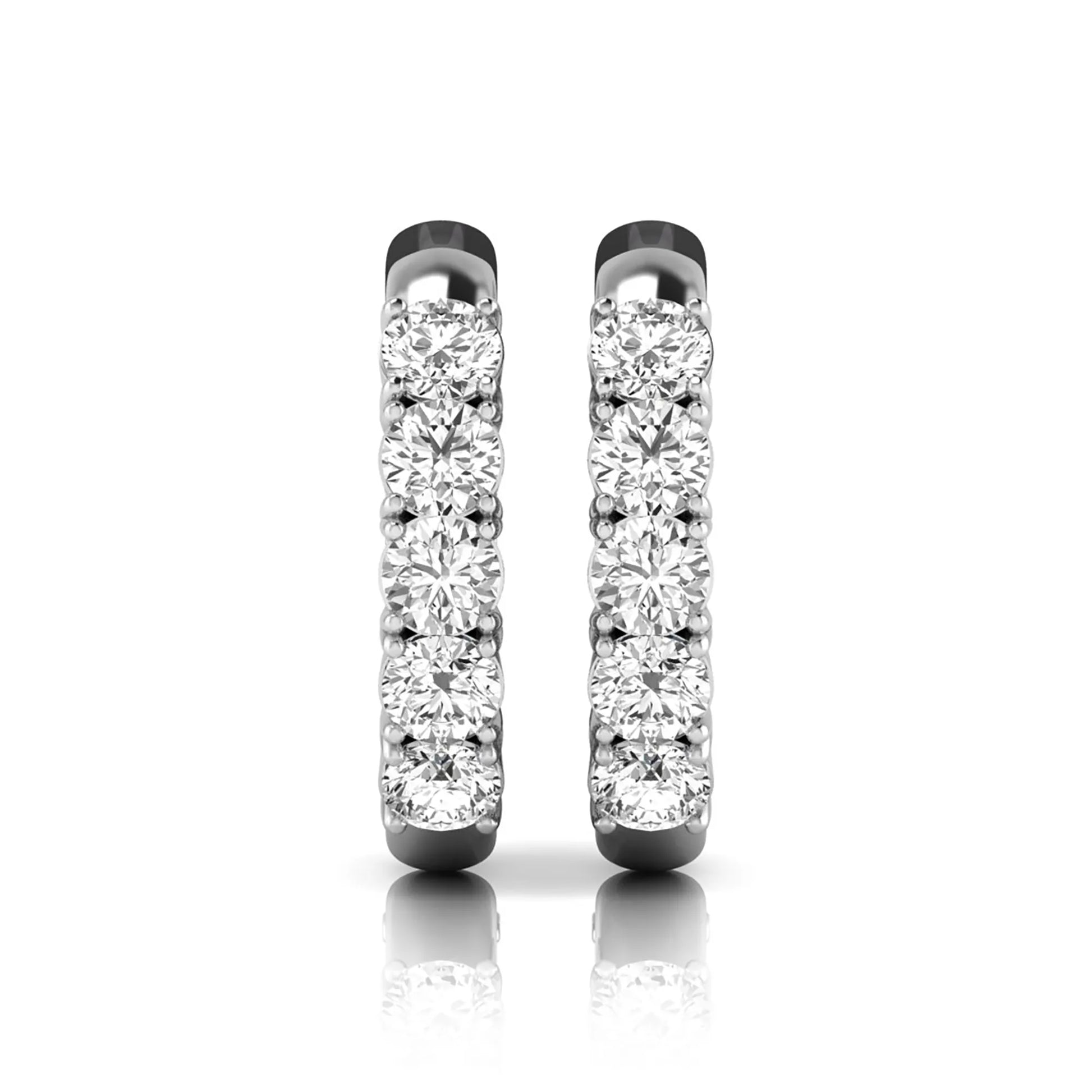 Round cut lab grown diamond front-facing huggie hoop earrings featuring a shared four prong setting, hinged snap closure, and polished white gold finish.