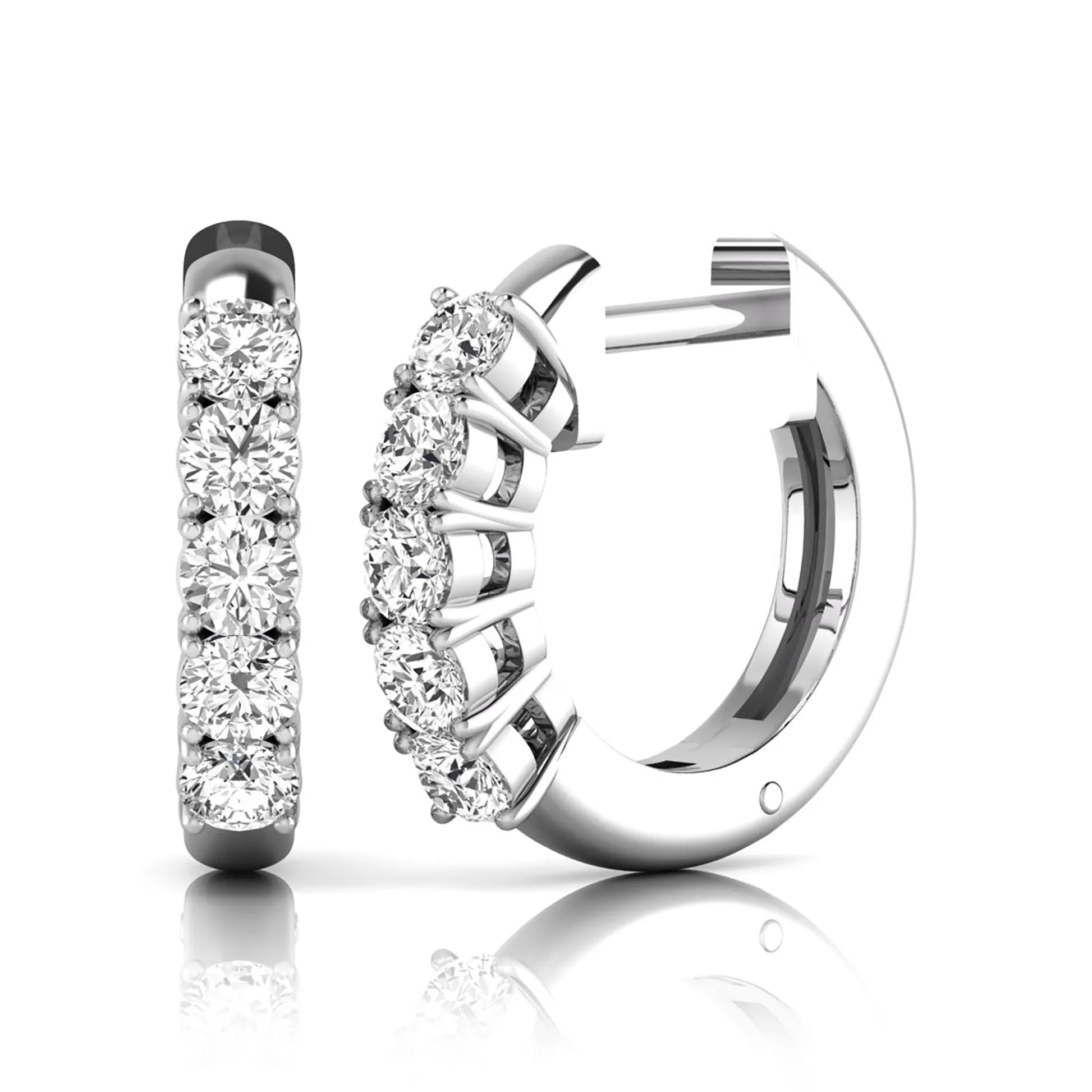 Round cut lab grown diamond front-facing huggie hoop earrings featuring a shared four prong setting, hinged snap closure, and polished white gold finish.