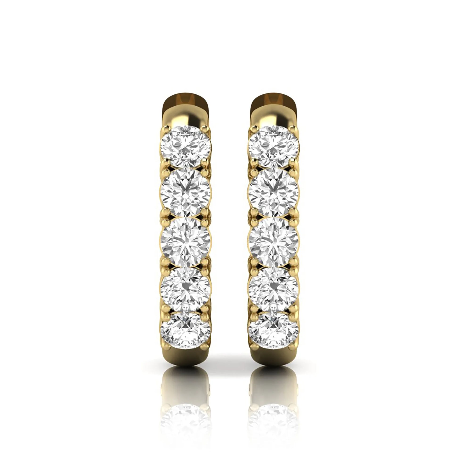 Round cut lab grown diamond front-facing huggie hoop earrings featuring a shared four prong setting, hinged snap closure, and polished yellow gold finish.