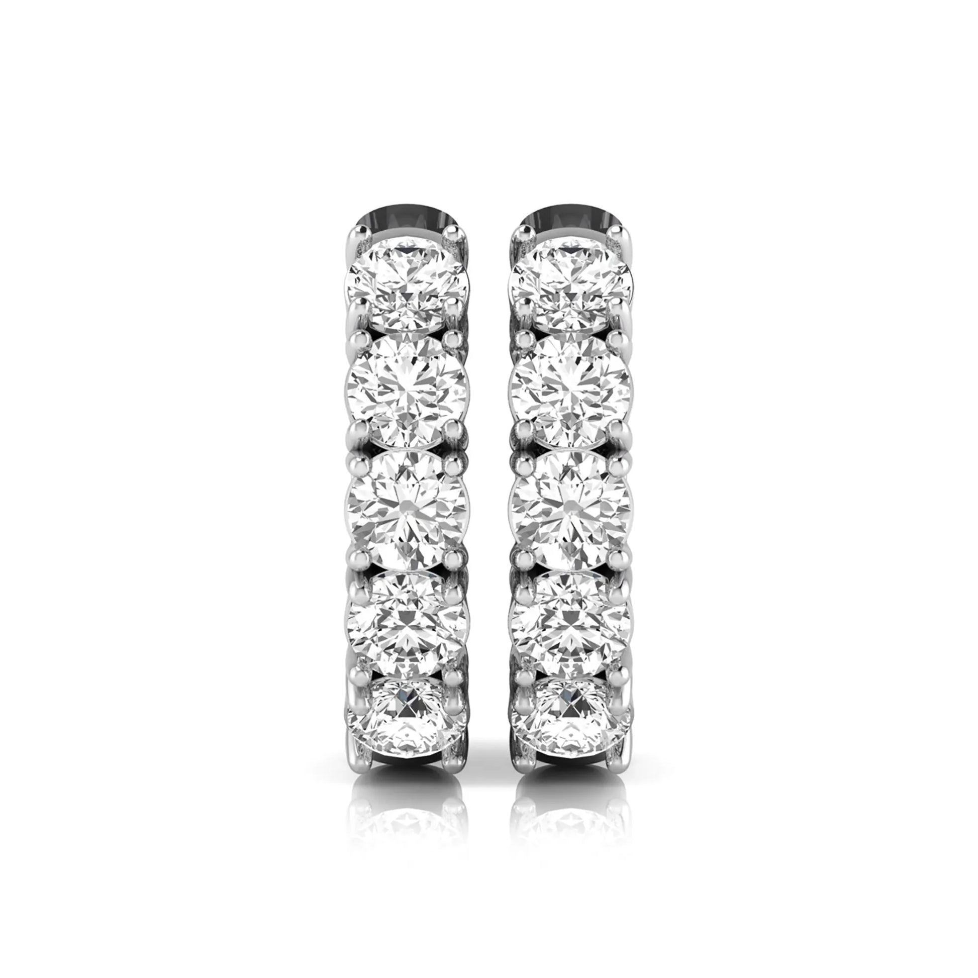 Round cut lab grown diamond huggie hoop earrings featuring five front-facing diamonds in a shared four prong setting with a hinged snap closure and polished white gold finish.