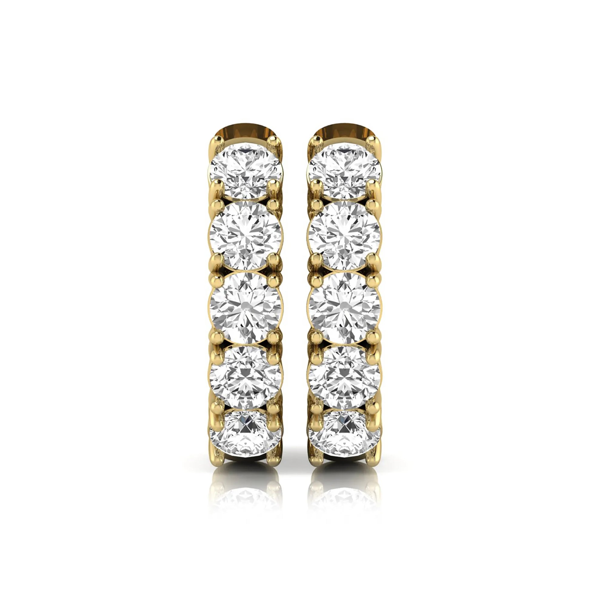 Round cut lab grown diamond huggie hoop earrings featuring five front-facing diamonds in a shared four prong setting with a hinged snap closure and polished yellow gold finish.