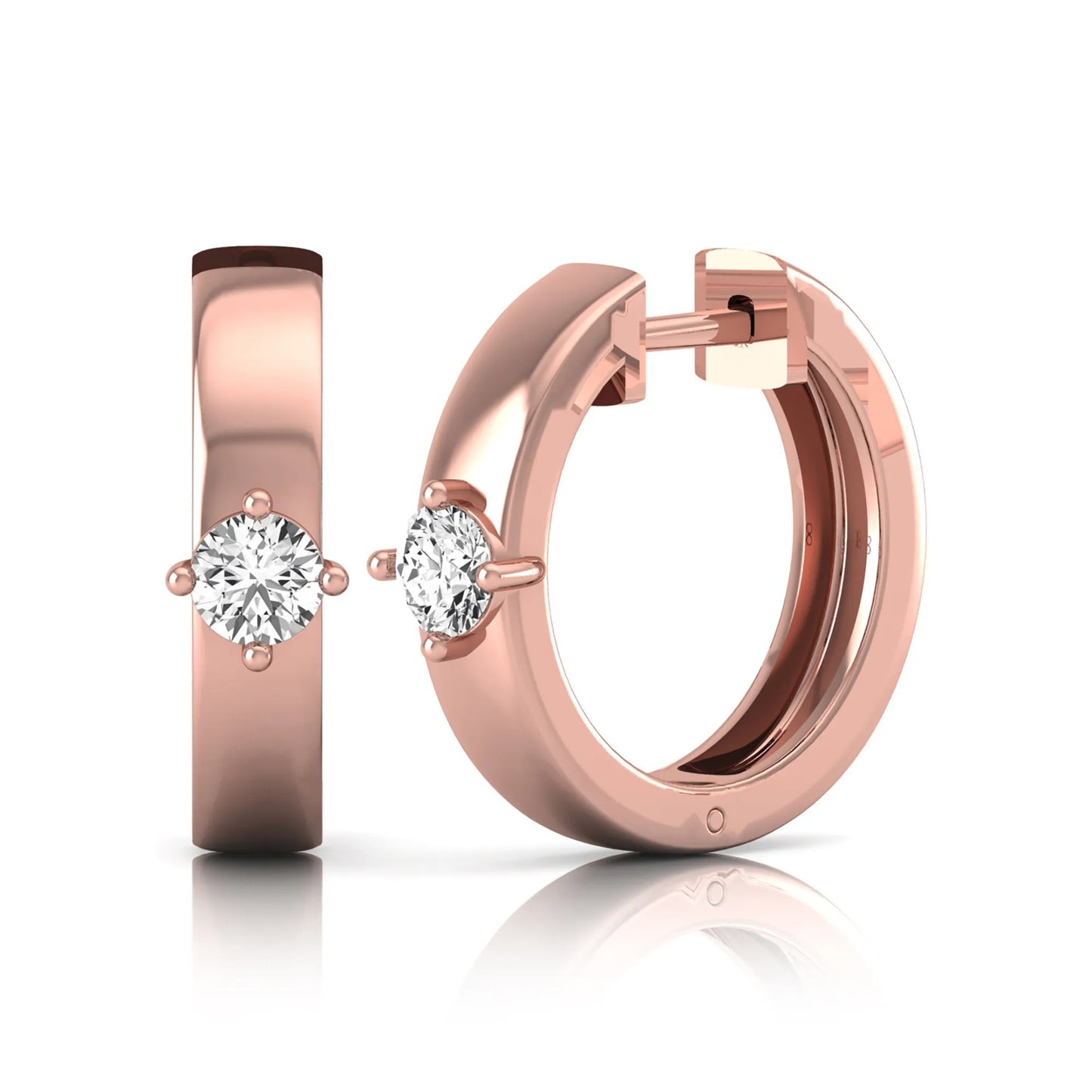 Round cut lab grown diamond huggie hoop earrings featuring a four prong setting and hinged snap closure shown in rose gold tone with a polished finish.
