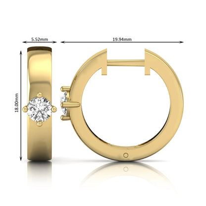 Round cut lab grown diamond huggie hoop earrings featuring a four prong setting and hinged snap closure shown in yellow gold tone with a polished finish.