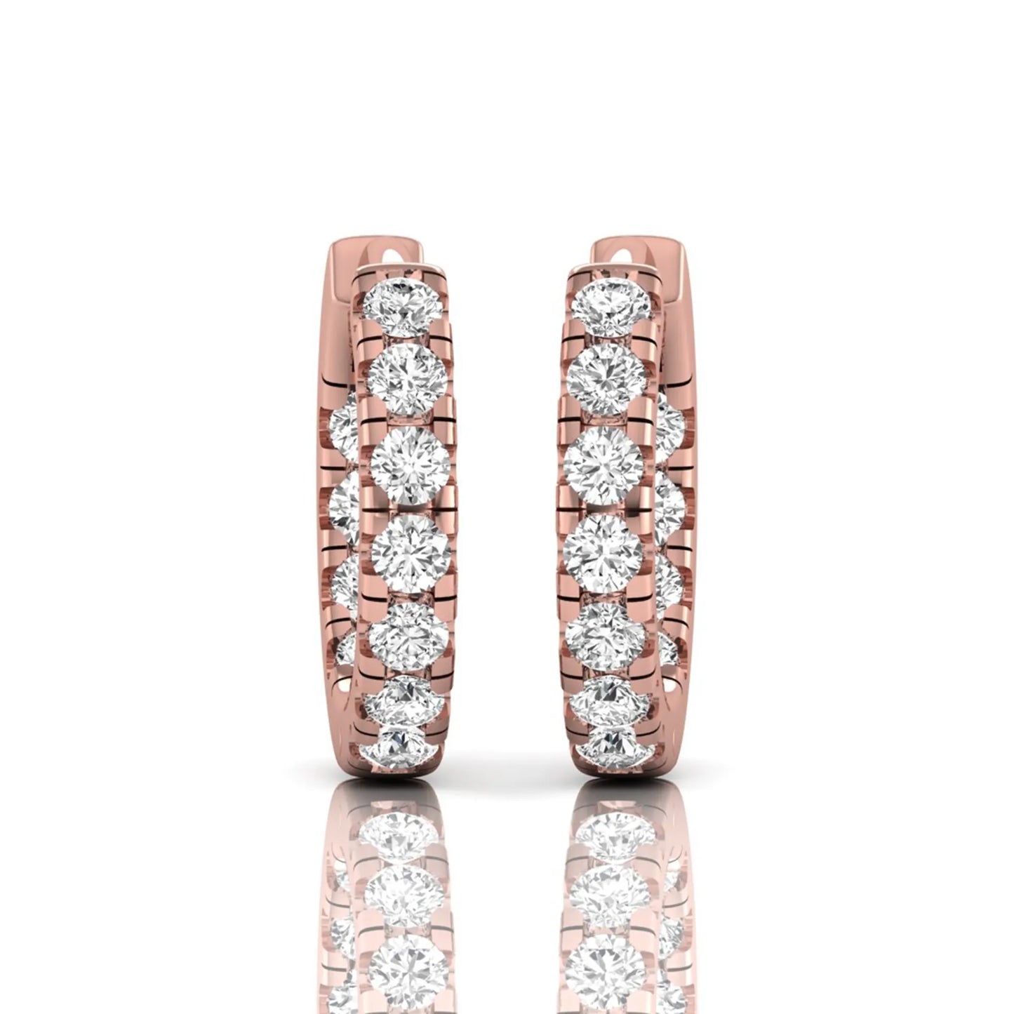 Round prong set lab grown diamond huggie hoop earrings featuring round cut diamonds in a classic hinged hoop design with rose gold tone shown for display.