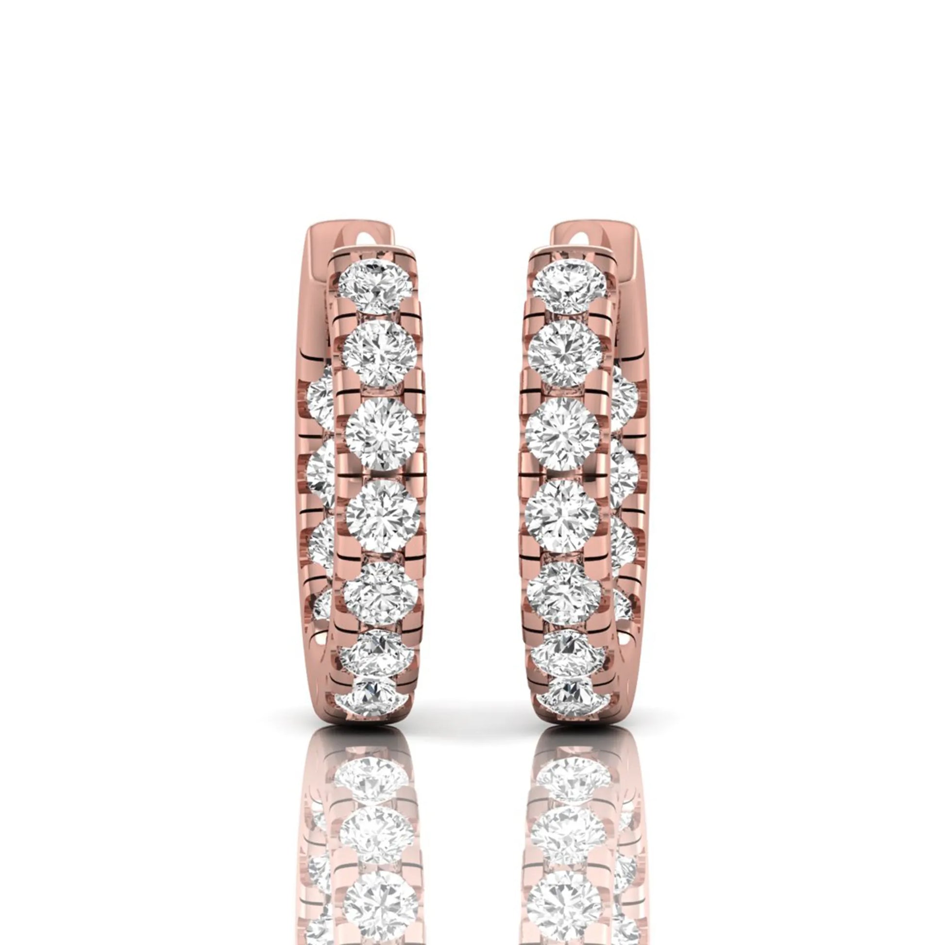 Round prong set lab grown diamond huggie hoop earrings featuring round cut diamonds in a classic hinged hoop design with rose gold tone shown for display.