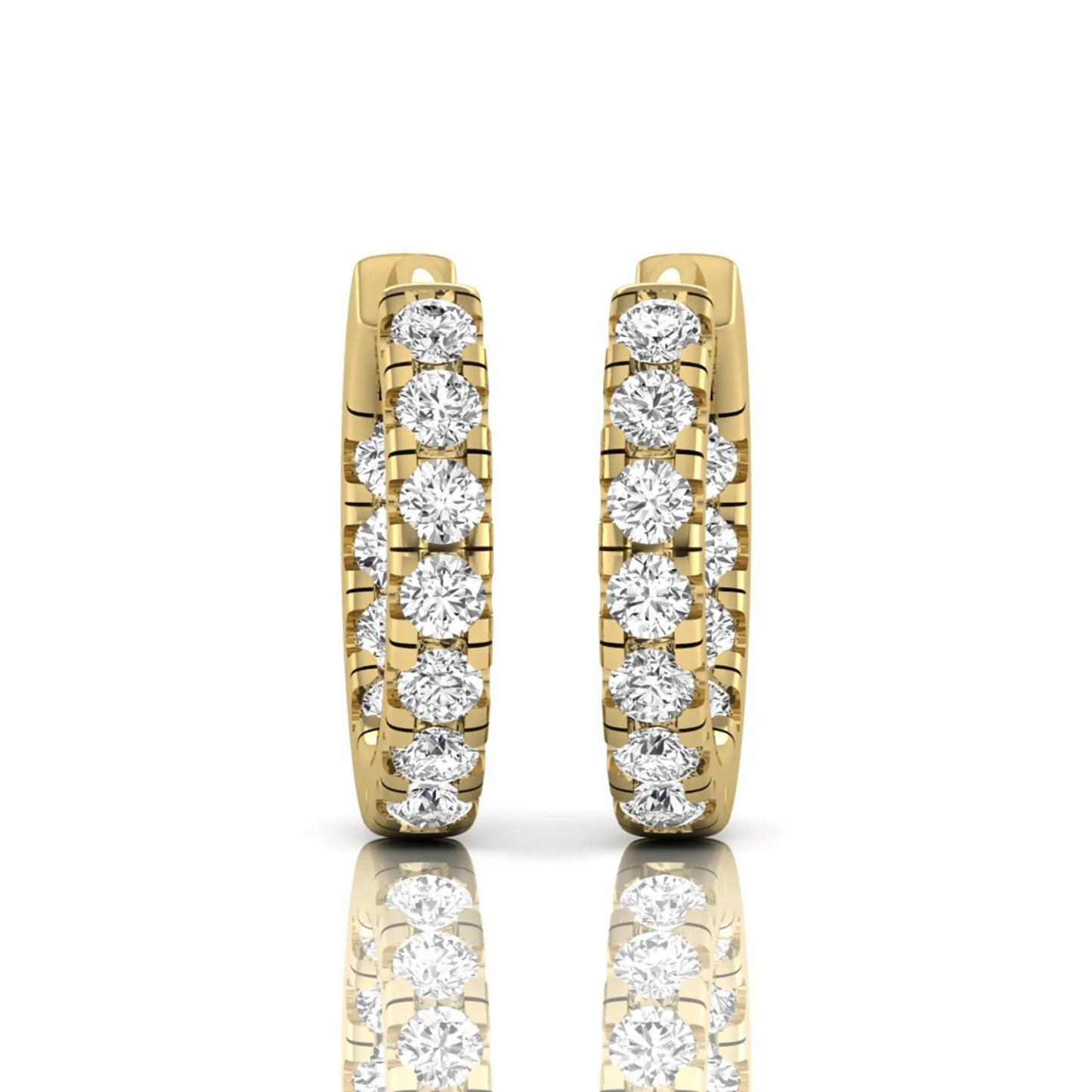 Round prong set lab grown diamond huggie hoop earrings featuring round cut diamonds in a classic hinged hoop design with yellow gold tone shown for display.