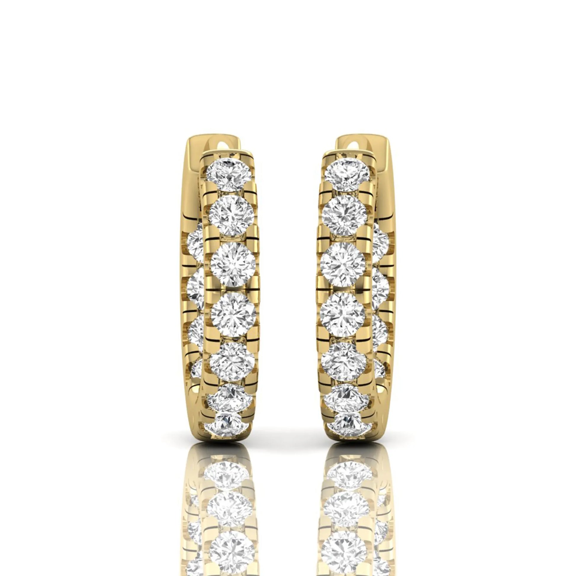 Round prong set lab grown diamond huggie hoop earrings featuring round cut diamonds in a classic hinged hoop design with yellow gold tone shown for display.