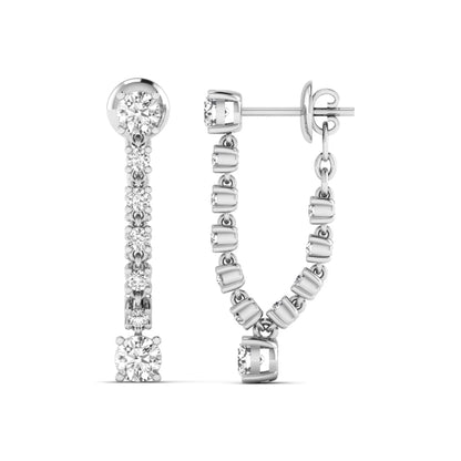 Round prong set lab grown diamond linear drop earrings featuring graduated round diamonds in a white gold finish with push back closure.