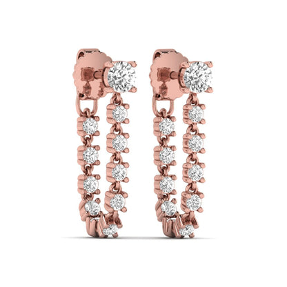 Round prong set lab grown diamond linear drop earrings featuring graduated round cut diamonds in a rose gold finish with push back closure.