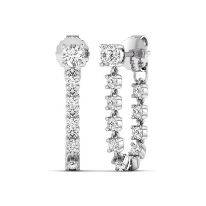 Round prong set lab grown diamond linear drop earrings featuring graduated round cut diamonds in a white gold finish with push back closure.