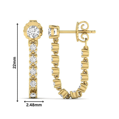 Round prong set lab grown diamond linear drop earrings featuring graduated round cut diamonds in a yellow gold finish with push back closure.