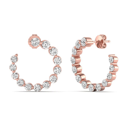 Round prong set lab grown diamond open hoop earrings featuring brilliant round cut diamonds in a rose gold finish with push back closure.