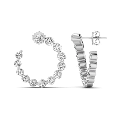 Round prong set lab grown diamond open hoop earrings featuring brilliant round cut diamonds in a white gold finish with push back closure.