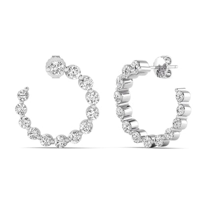 Round prong set lab grown diamond open hoop earrings featuring brilliant round cut diamonds in a white gold finish with push back closure.