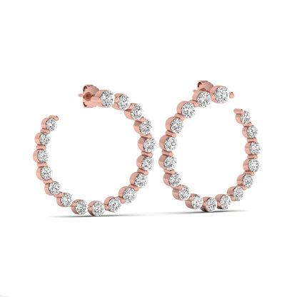 Round prong set lab grown diamond open hoop earrings featuring brilliant round cut diamonds in a rose gold finish with push back closure.