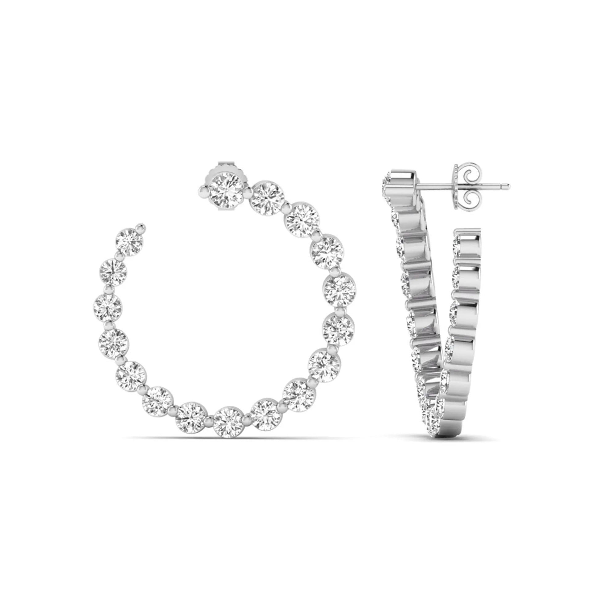 Round prong set lab grown diamond open hoop earrings featuring brilliant round cut diamonds in a white gold finish with push back closure.