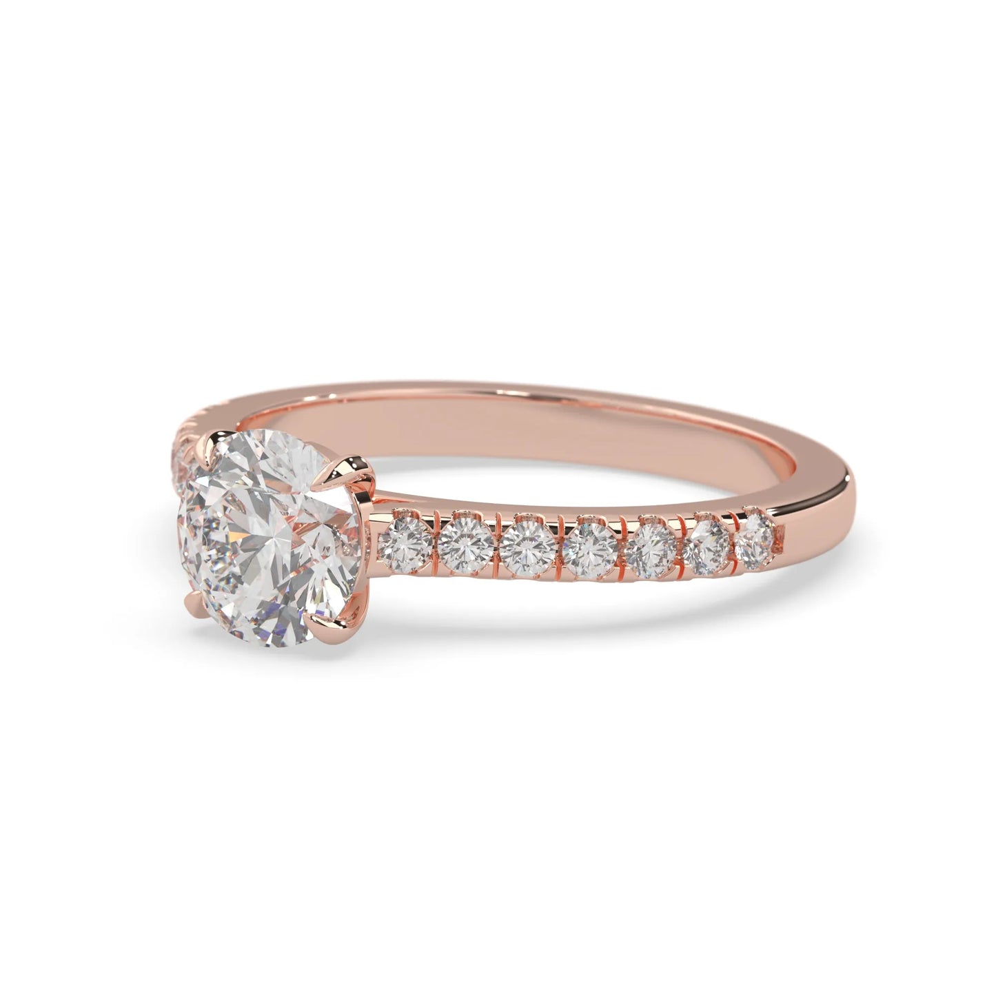 rose gold Round cut lab grown diamond prong set engagement ring with pavé band and yellow metal tone design