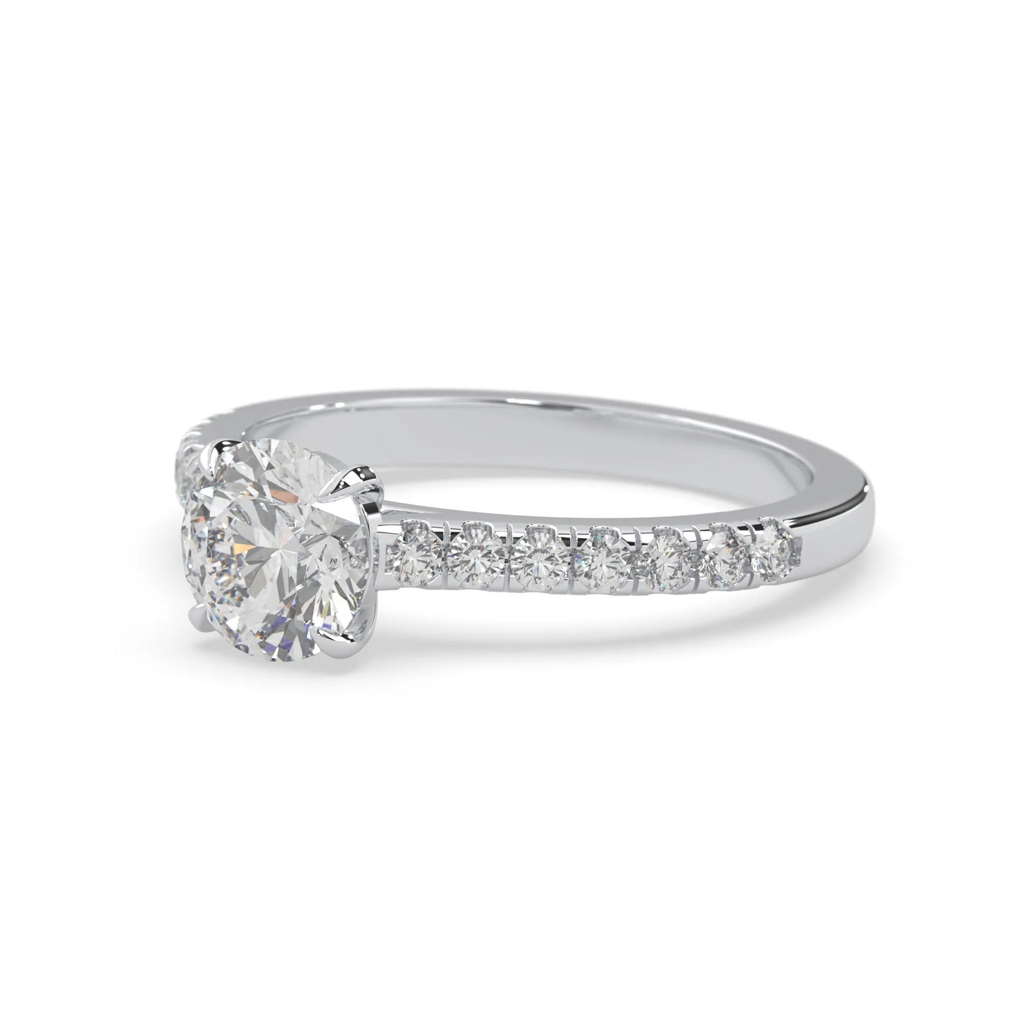 white gold Round cut lab grown diamond prong set engagement ring with pavé band and yellow metal tone design