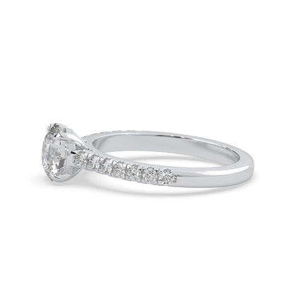white gold Round cut lab grown diamond prong set engagement ring with pavé band and yellow metal tone design