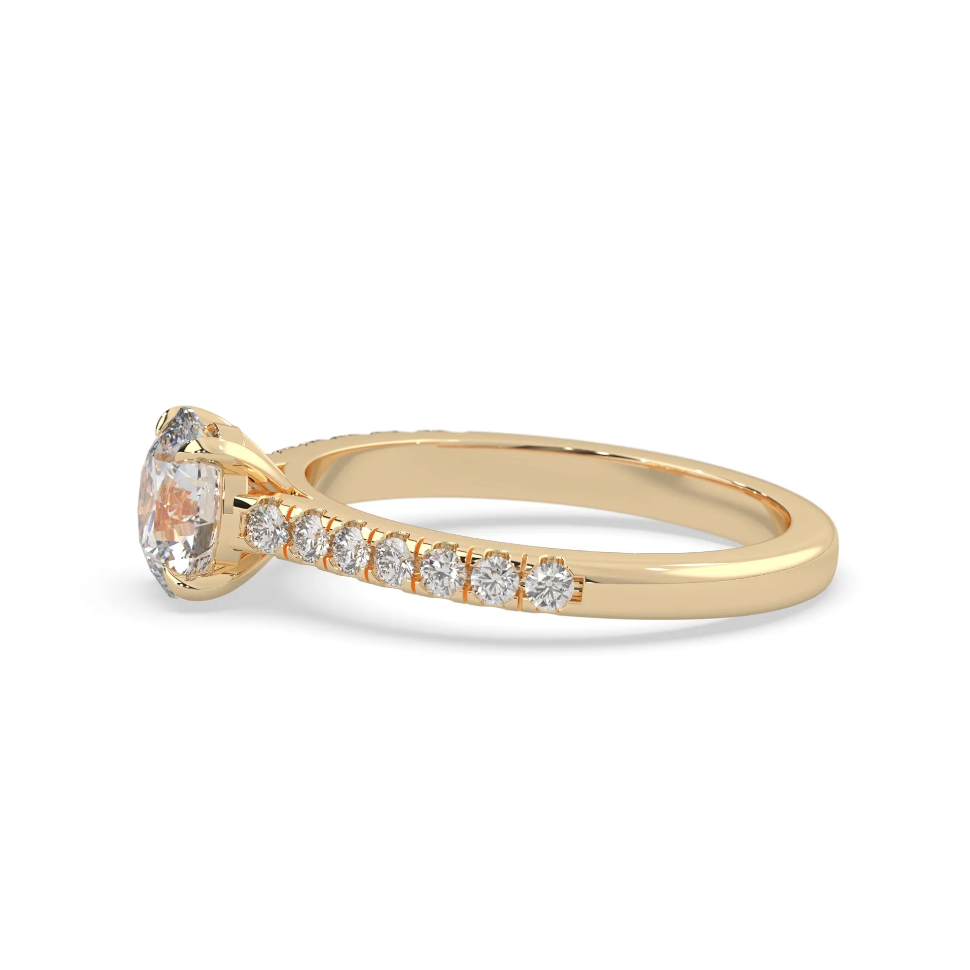 yellow gold Round cut lab grown diamond prong set engagement ring with pavé band and yellow metal tone design