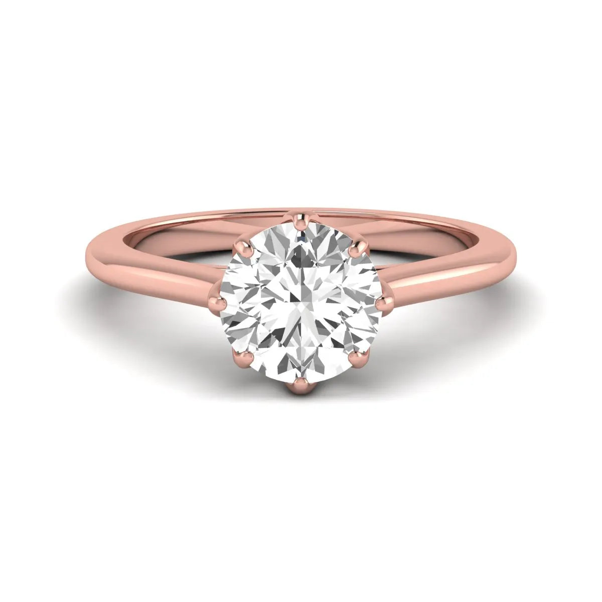 Round cut lab grown diamond solitaire engagement ring featuring a six-prong setting and polished rose gold tone band.