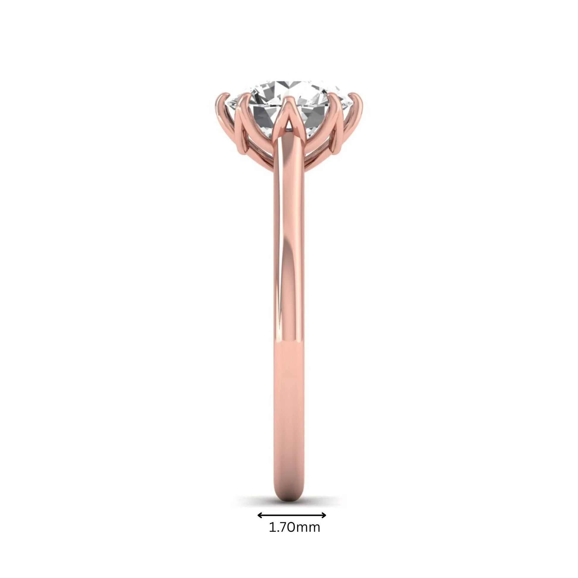 Round cut lab grown diamond solitaire engagement ring featuring a six-prong setting and polished rose gold tone band.