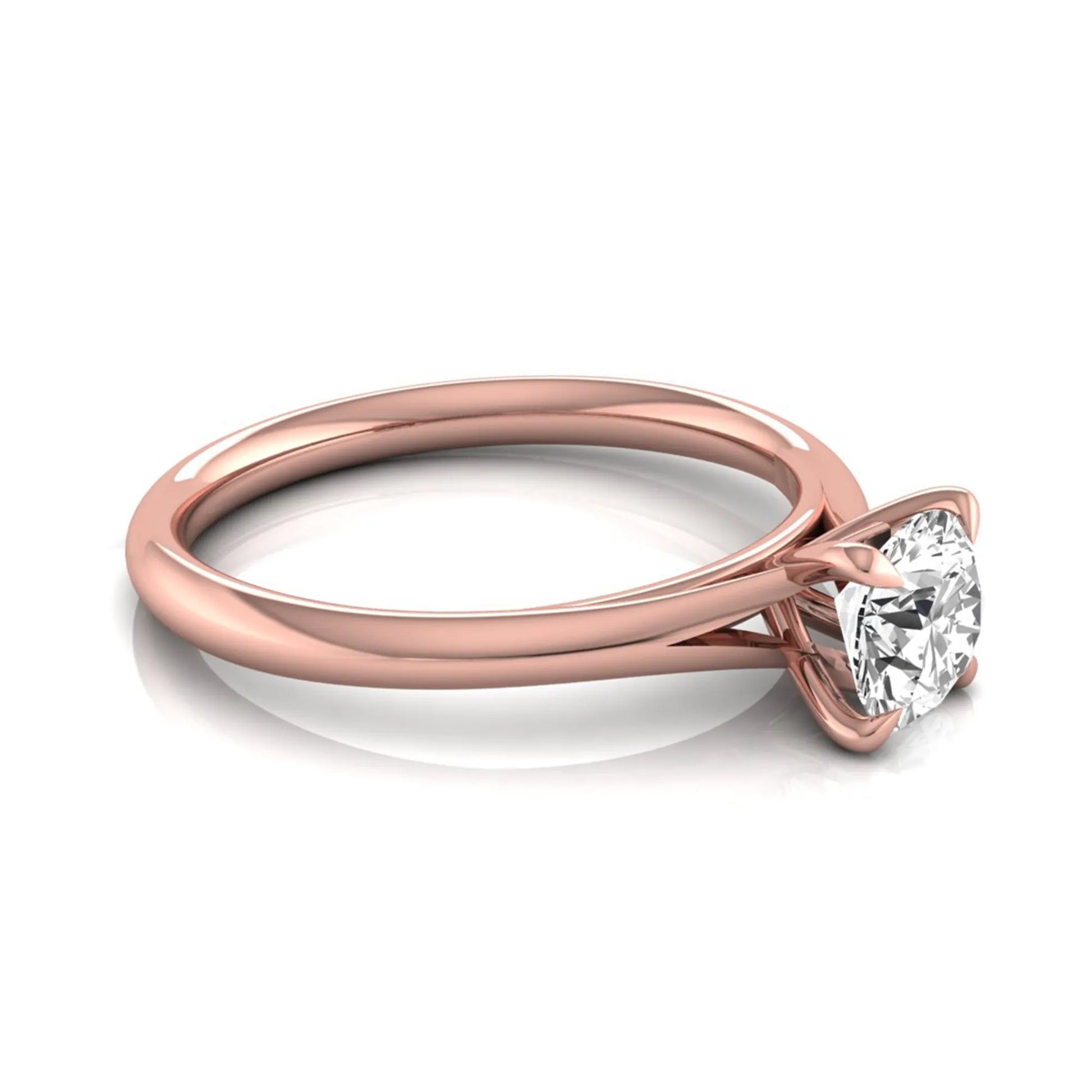Round prong set lab grown diamond solitaire engagement ring featuring a 0.70 carat round center diamond in a classic four-prong setting in rose gold