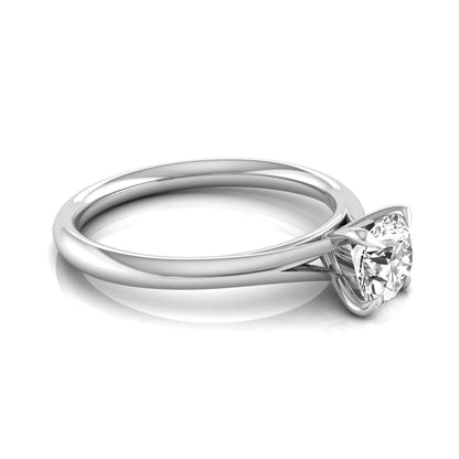Round prong set lab grown diamond solitaire engagement ring featuring a 0.70 carat round center diamond in a classic four-prong setting in white gold
