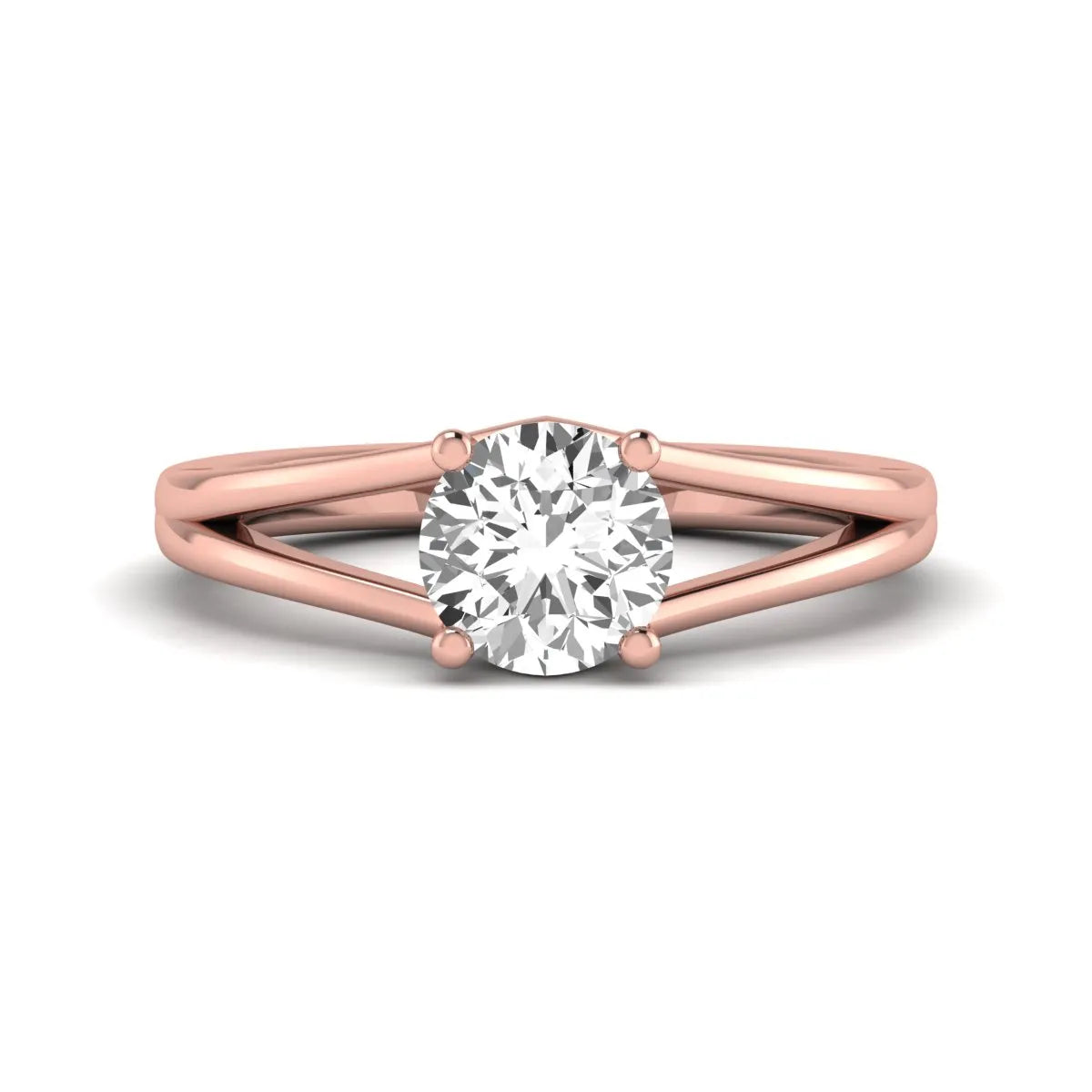 Round cut lab grown diamond solitaire split shank engagement ring with classic prong setting and rose gold tone shown for design reference.