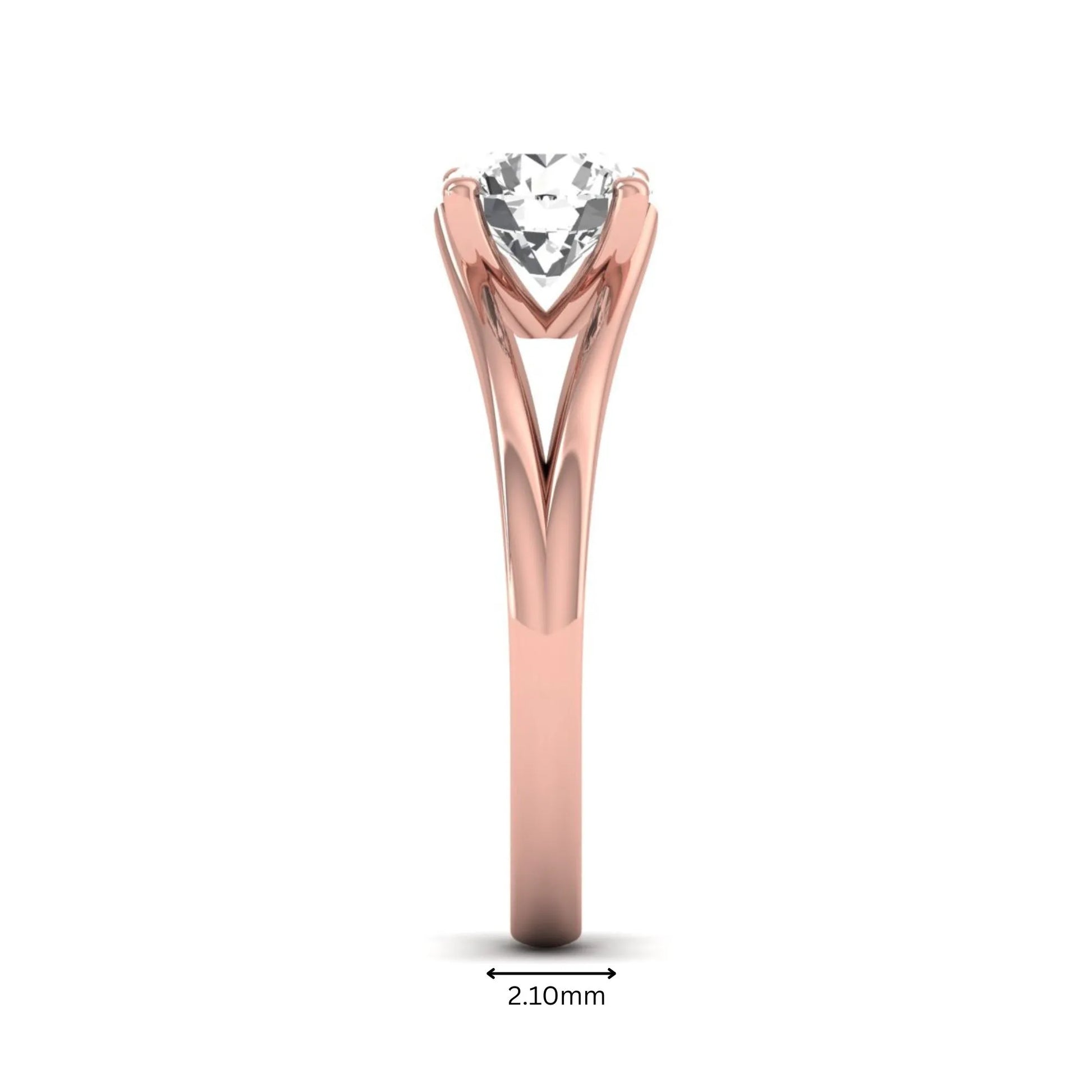 Round cut lab grown diamond solitaire split shank engagement ring with classic prong setting and rose gold tone shown for design reference.